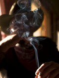 Cowboy Actor Smoking on an Old Western Movie Set