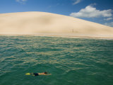 Snorkeling Alongside a Sandy Island Beach