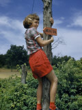 Girl Climbs Signpost Marking Trail Near Abraham Lincoln's Birthplace