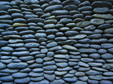 Elegant and Unusual Bathroom Wall Built of Volcanic River Stones