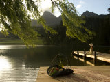 Basket of Fruit and a Woman Sitting at Water's Edge