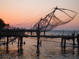 Silhouette of Fishing Nets on a Dock at Twilight