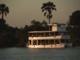 Tour Boat Cruises the Zambezi River  Looking for Wildlife
