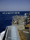 Sailor Watches Projectiles Splash into Ocean in Training Exercise