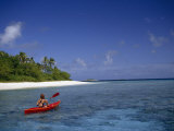 Young Woman Kayaking Among Tonga's Vavu's Islands