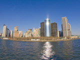 New York City Skyline with Sun Reflecting Off of a Metallic High Rise