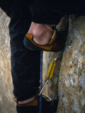 Close Up of a Team Member's Feet Wedged in a Crack in the Granite