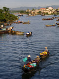 Fishing Boats Ply the Thu Bon River Near the Market at Hoi An