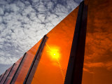 Bright Orange Sound Barrier by a Freeway