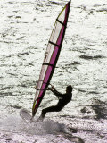 Windsurfer Sailing across the Water