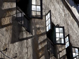 Open Windows Cast Shadows on a Wall in Zanzibar