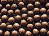 Large Group of Chocolates Which All Look the Same Except for One