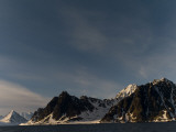 Snowy Mountains Near the Water's Edge
