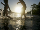 Two Young Boys Play in Shallow Water of the Potomac River