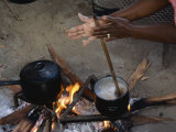 Woman Prefers to Cook the Traditional Way  over a Wood Fire