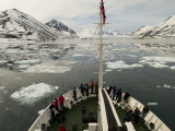 Boat Makes it's Way Through an Icy Passageway