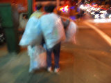 Woman Collecting Recyclables on a San Francisco City Street