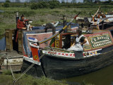 Wives of Bargemen Rest and Talk on Decks of Barges Tied Up in a Canal
