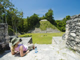 Young Woman Relazing at the Mayan Ruins at Caracol  Belize