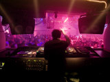 Dj Plays to His Crowds on a Busy Night at Zouk in Singapore