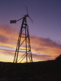 Silhouetted Windmill at Sunset