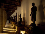 Statues of Buddha Line a Hallway in the Grand Palace Complex