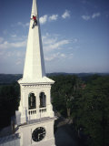 Man Paints the Steeple of a Vermont Church