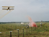 Researchers Signal a Plane Flying Low to Distribute Insecticide