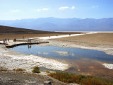 Tourists Walking on Badwater Basin in Death Valley National Park  Ca