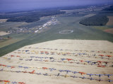 Colorful Airplanes are Parked in Rows at a Regional Airstrip