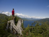 Man Looks Down onto Nitinat Lake on a Summer Day