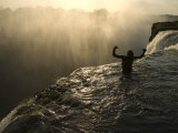 Bathing in a Swimming Hole at the Top of Victoria Falls