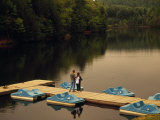 Man and Woman Enjoying Fishing from a Pier at Pipestem State Park