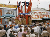 Spectators Await Performance of Hawaiian Dancers at Circus Side Show