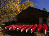 Canoes Await River Runners at a Riverside Outfitter