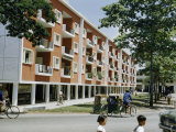 New Building Contains Apartments over a First-Floor Shopping Arcade