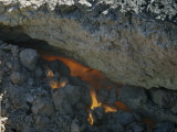 Close-up Through Crevice of Underground Flames Consuming Lignite Coal