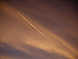 Jet Vapor Trails in the Sky at Twilight