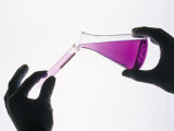 Chemical Being Poured into a Glass Tube
