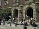 Students Gather Outside an Entrance to a University Library
