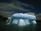 Melting Iceberg under a Cloud Filled Sky