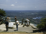 Tourists Standing Beside Civil War Cannons Overlook Tennessee River