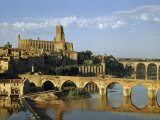 Cathedral and Bridges Reflect in a Tranquil River in Morning Light