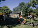 Tourists Linger Outside Replica of Abraham Lincoln's Boyhood Home