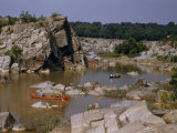 Men Paddle Canoes on a Tranquil Backwater Above Great Falls