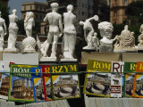 Travel Magazines in Assorted Languages and Souvenir Statues for Sale