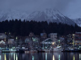 Quaint Fishing Village in the Shadow of Snow-Blanketed Mountains