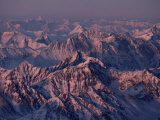 Aerial View of Snow-Dusted Jagged Majestic Mountains
