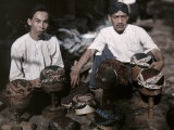 Two Men Sell Hats Made from Batik Clothes