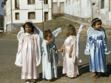 Girls Dress Like Angels in Robes  Crowns  and Wings for Easter Parade